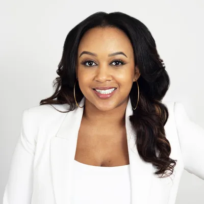 Portrait of Toni Bullock in a white blazer
